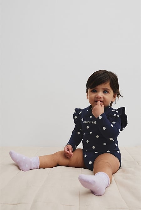 Organically Grown Cotton Blend Frill Long Sleeve Logo Bodysuit