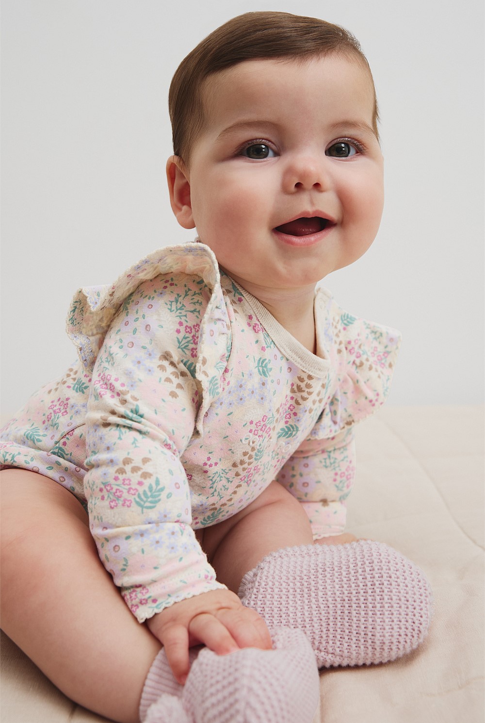 Organically Grown Cotton Blend Frill Long Sleeve Logo Bodysuit