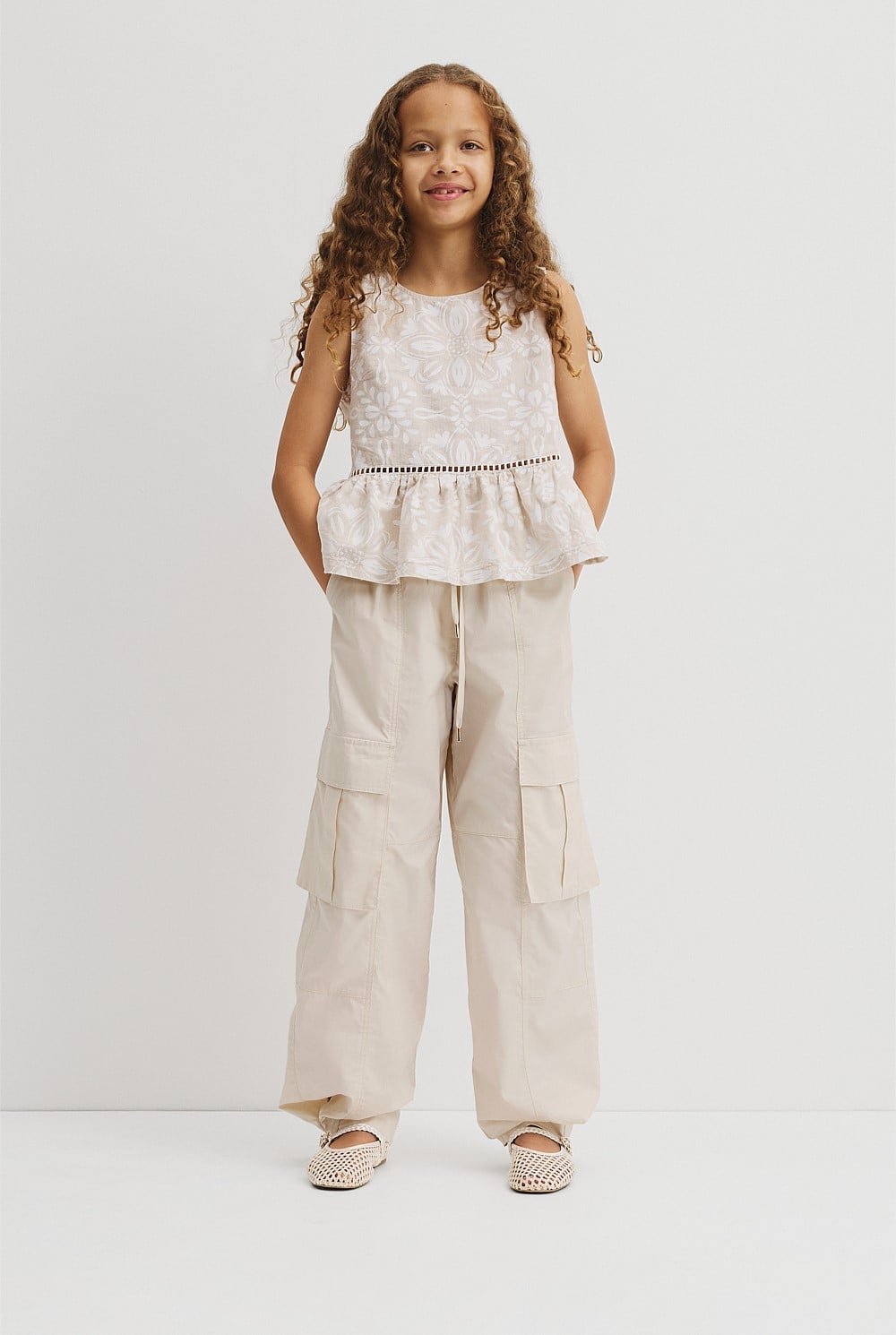 Teen Sleeveless Peplum Top