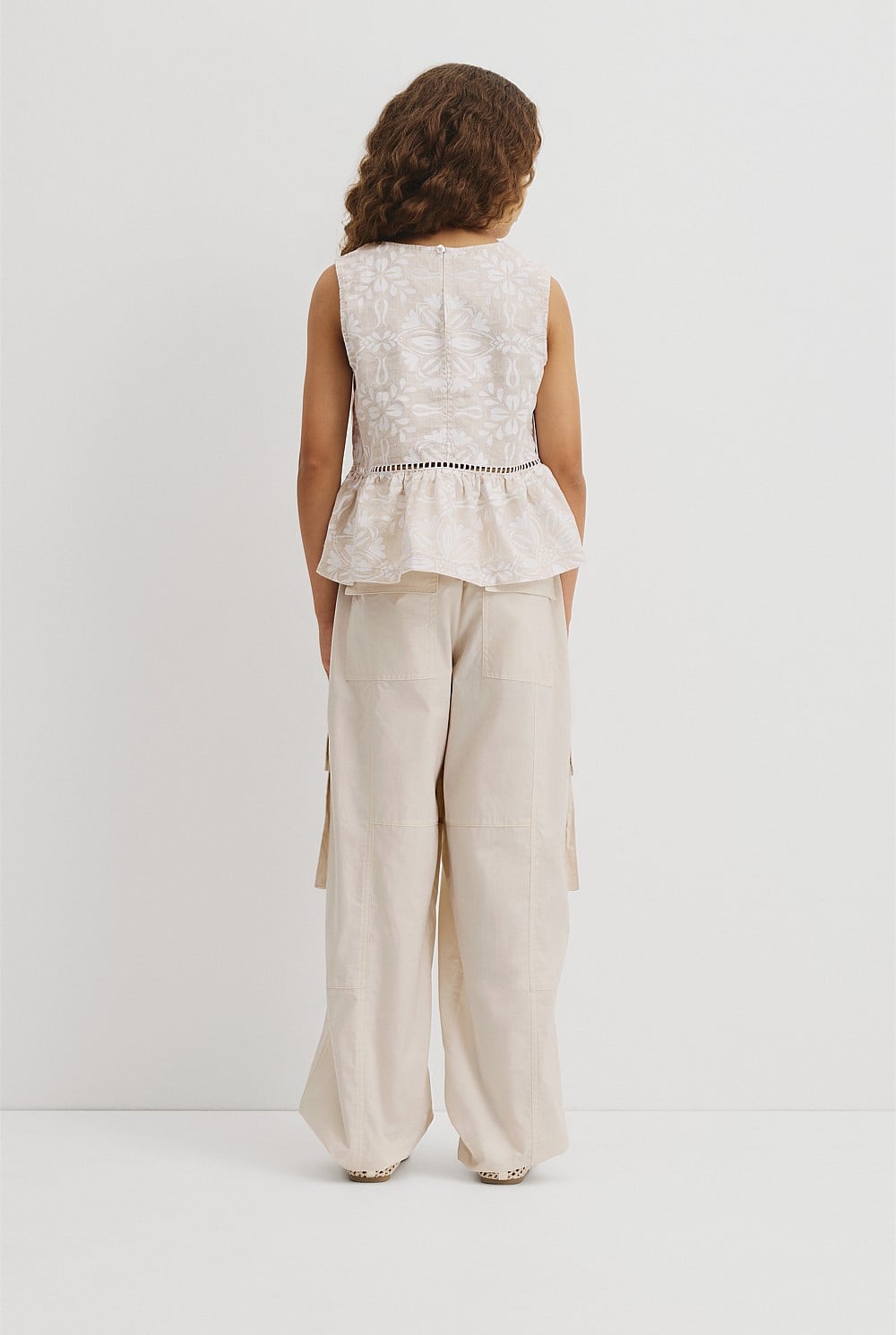 Teen Sleeveless Peplum Top