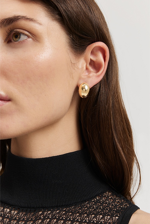 Large Twist Oval Huggie Earrings main image 0